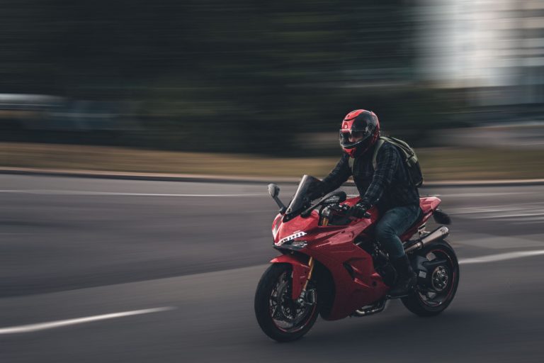 an image of a motorbiker moving very fast. taken at Upper Hanover Street, Sheffield. United Kingdom - 22 September 2021
